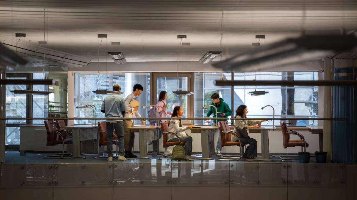 Students actively engaging in laboratory experiments in a well-equipped science lab.