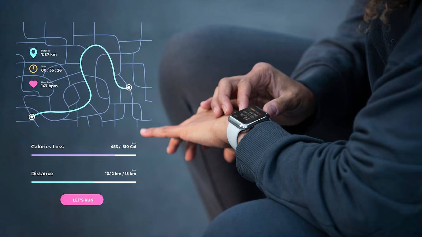 Person checking fitness watch displaying calories, heart rate, and run map on dark background.